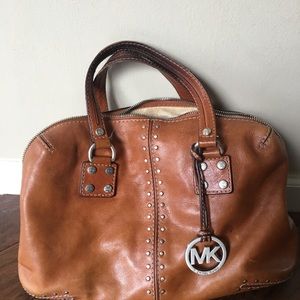 Michael Kors, Prada purses